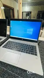 HP laptop with bag and mouse