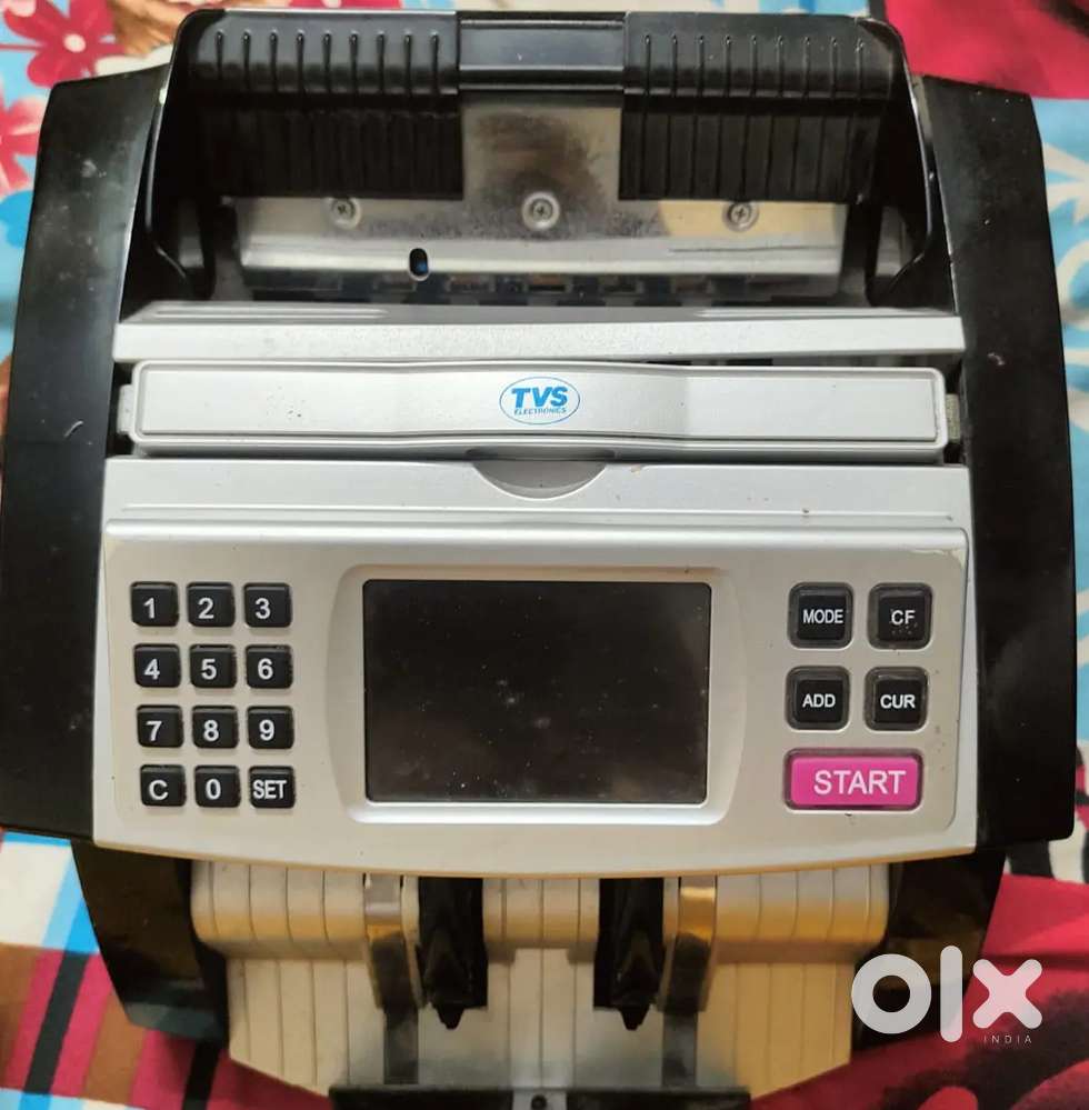 Cash counting machine.