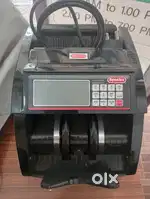 CASH COUNTING MACHINE