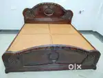 Double bed made of premium wood.