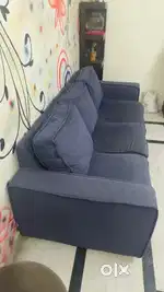 Three seater sofa with teak wood frame