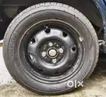 Bridgestone high profile wide tyre and normal Rim 13.