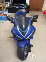 Kids ride on electric bike