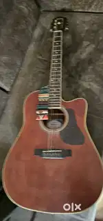 Semi Acoustic guitar with guitar stand.(mantic brand) Fishman pickup