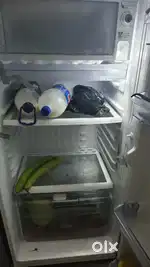 2 months old fridge 185 litre