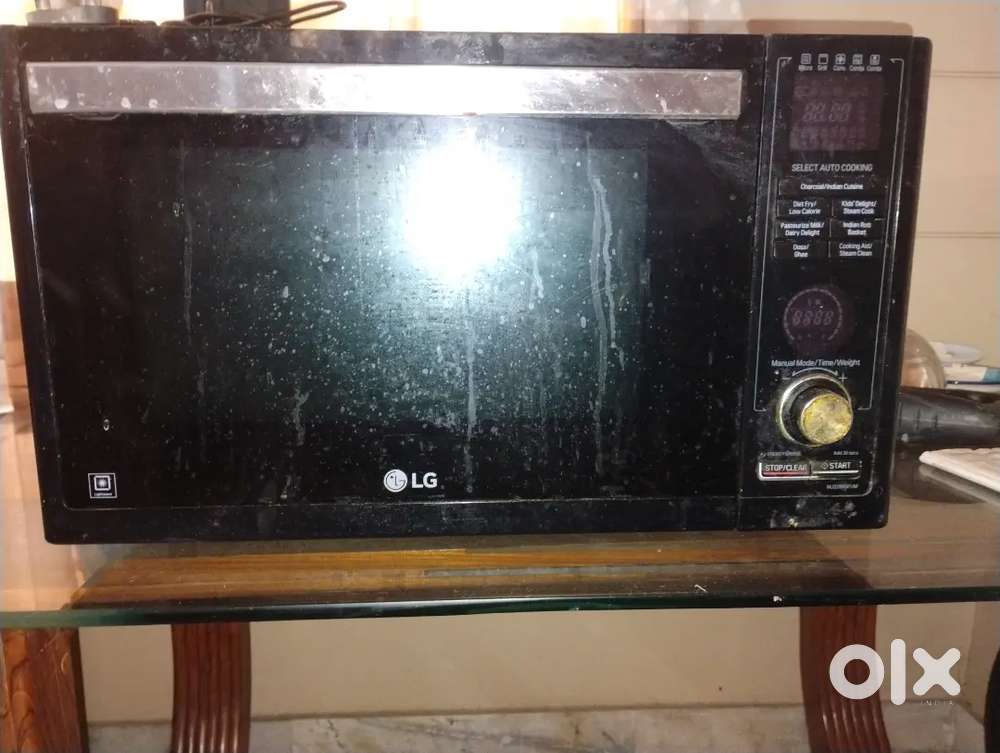 LG Microwave CHARCOAL Grill model 28 litres for immediate sell