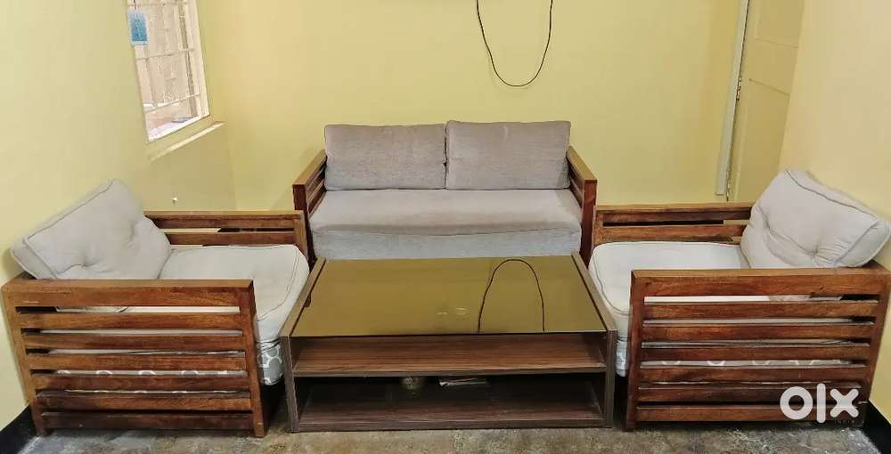 Wooden sofa set with good quality gadda and centre table