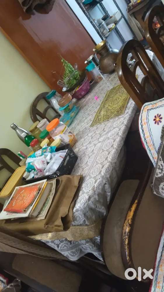 Dinning set in best condition with heavy wooden work.