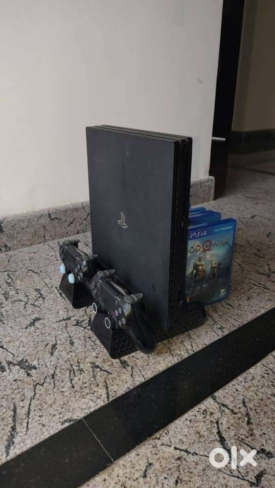 PS4 Pro (1TB) with 6 Game CDs & Extras