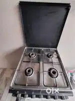 Gas stove with 4 burners , grill and oven
