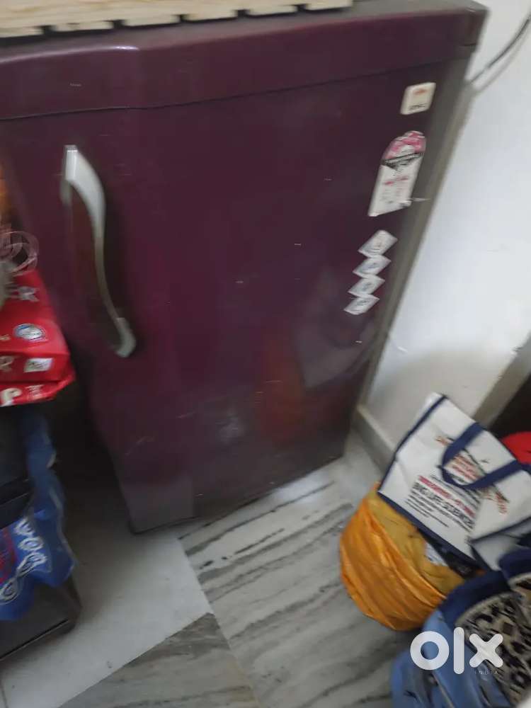 Godrej Hardly Used Fully Functional Cherry Red ..5 star Enery Saving