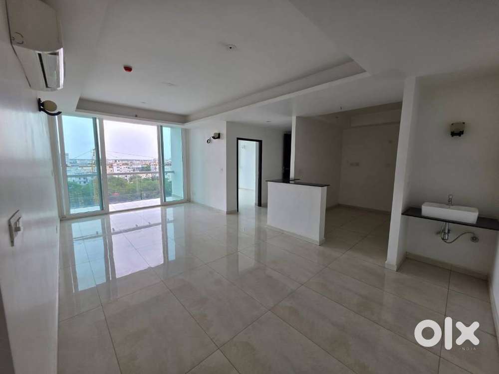 Spacious 3BHK in Tellapur with high glass walls and sunset views