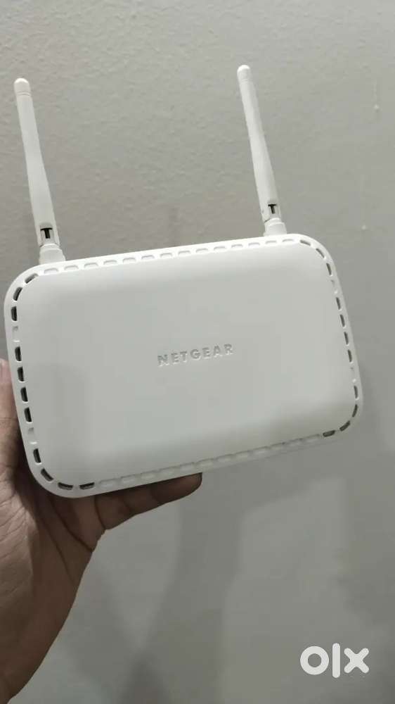 NETGEAR WNR614 - Wireless router 4-port switch 2.4 GHz