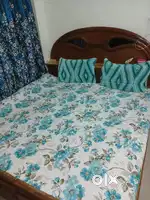 Both in very good condition brown in colour sagoon bed and dressing