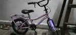 Pinkish purple & bluish yellow balancing bike from dubai