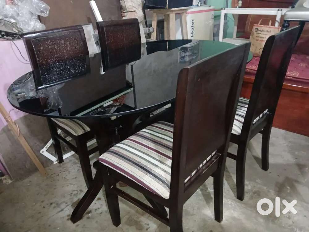 Two pieces four seater wooden dining table set