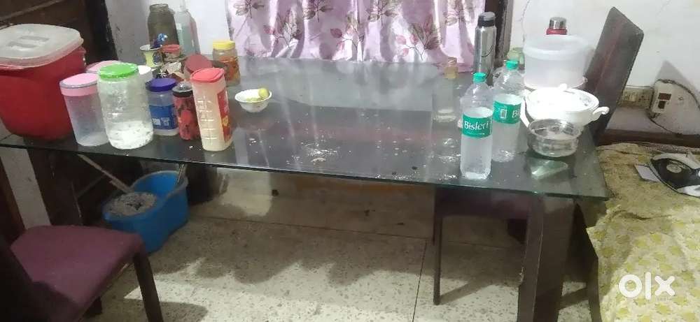 Glass dining with chairs