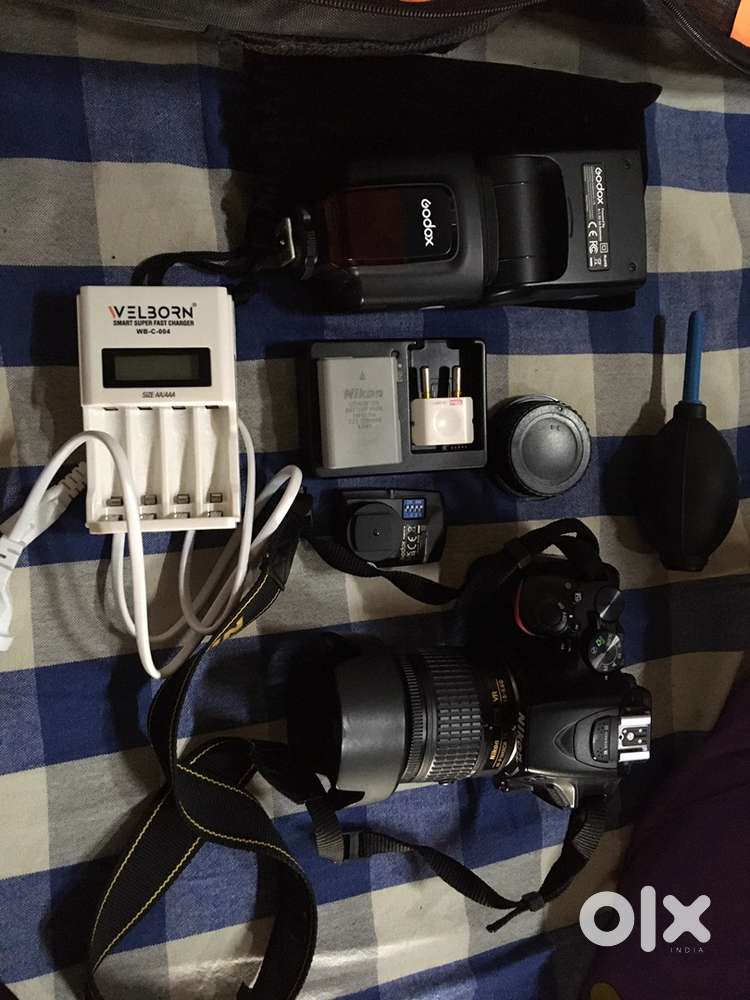 Nikon D5500  18 to 55 mm lens , godox external flash