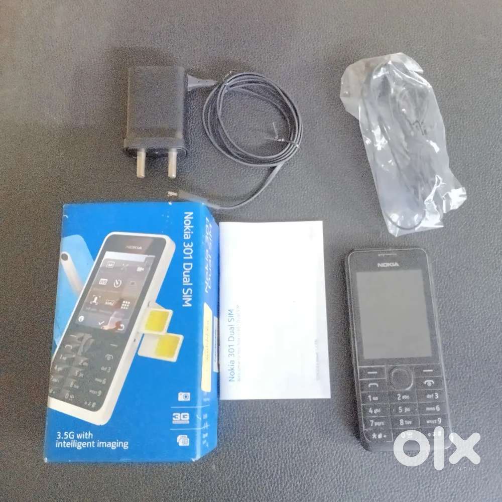 Nokia 301 Dual Sim with Original. Box Charger Earphones