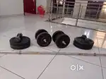 Dumbells and plates with steel rod.