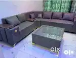 Grey sofa luxury feel for 10-12 people very comfortable glass table.