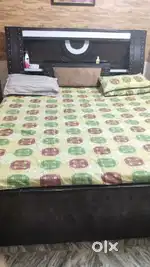 Double bed(without mattress) wd extra height as was made on order