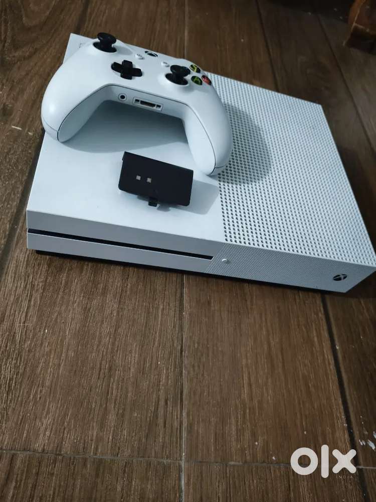 Xbox One S 1tb with controller battery pack..