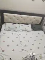 King size bed in affordable price with box design only of 2 years