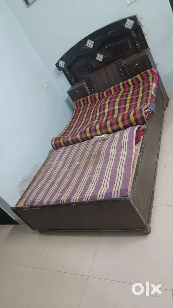 Bed with cabinet and head