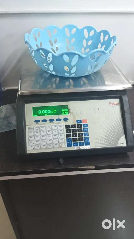 Weighing machine with barcode sticker