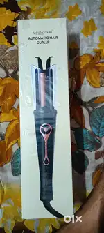 AUTOMATIC HAIR CURLER