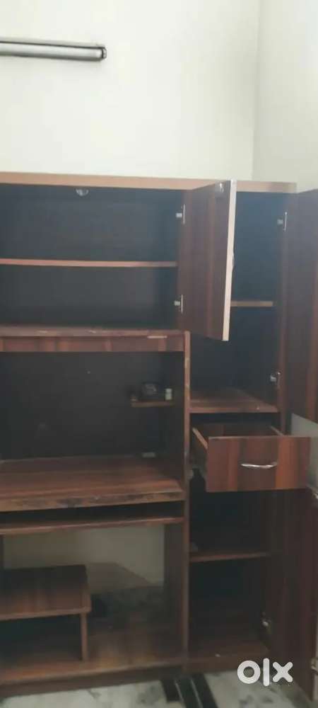 Spacious Wooden Computer Table with Cabinets and Storage
.