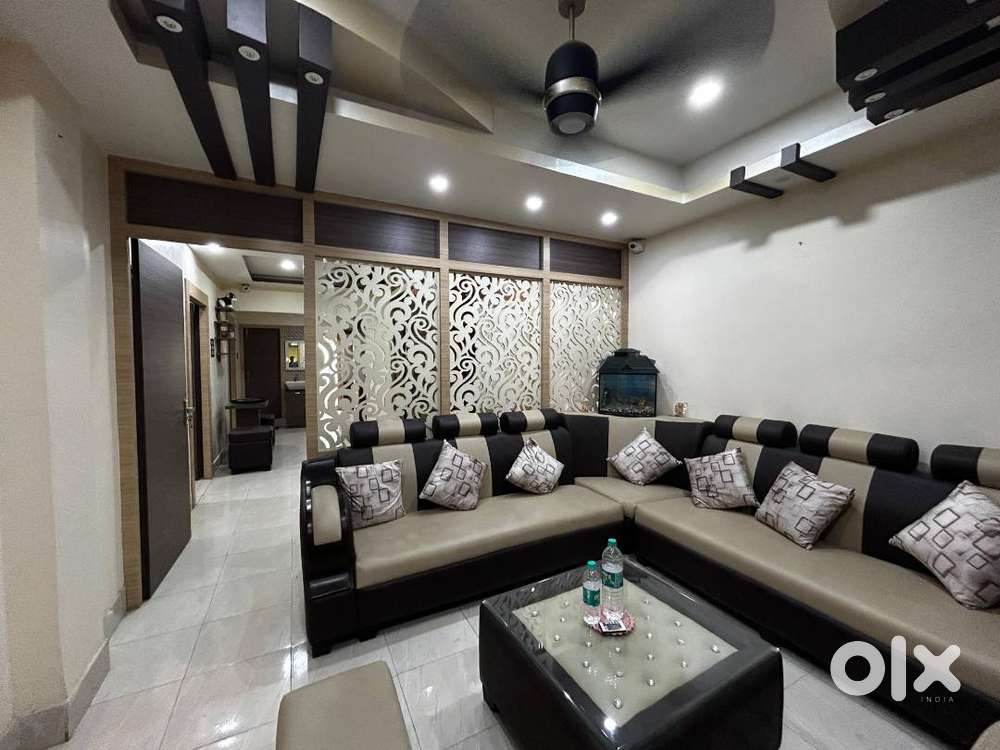 A well furnished flat with furniture and car parking.