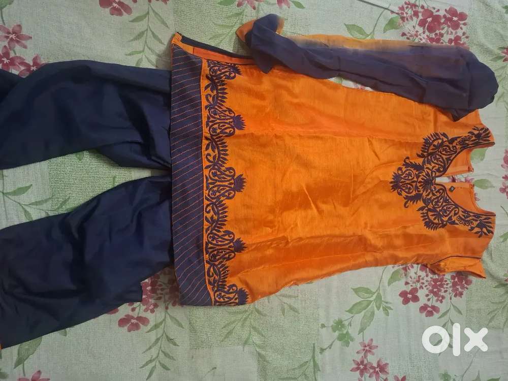 Beautiful red dress.orange patiala for girls below 16 years of age