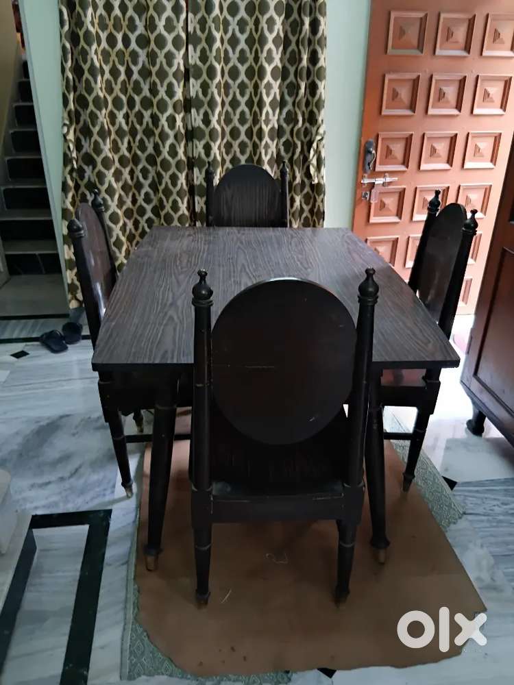 Dining table with 4 chairs as one chairs shown