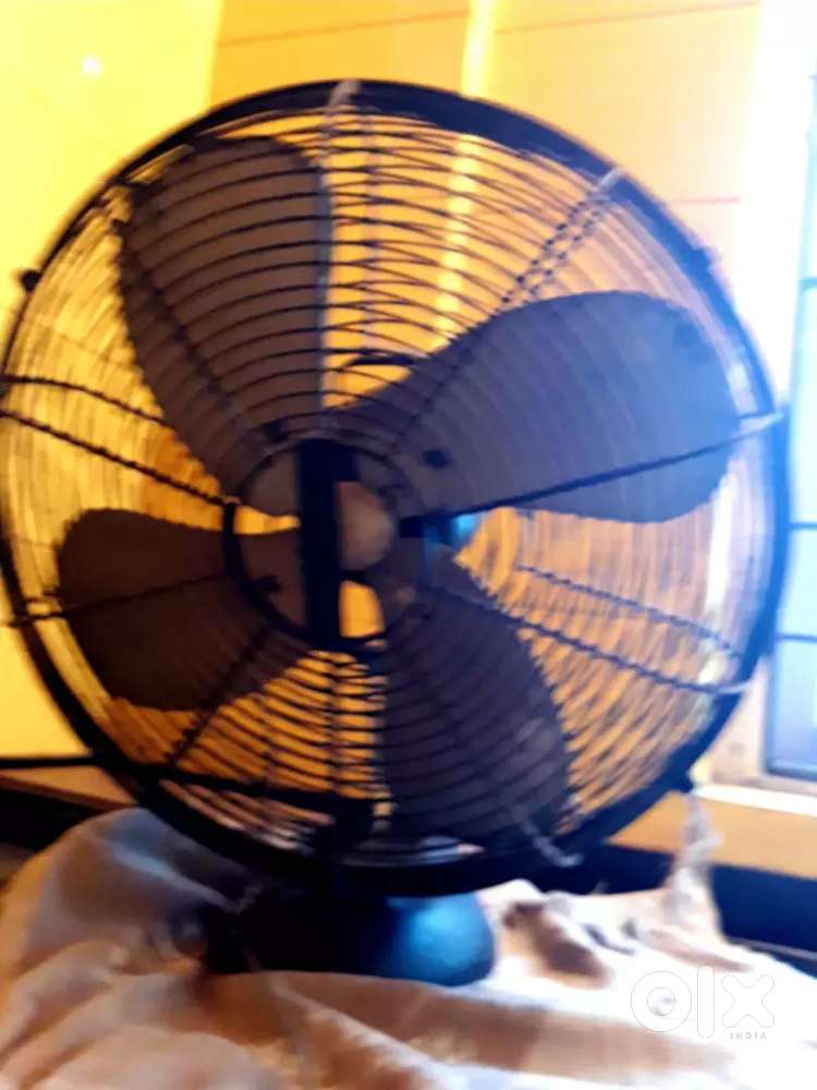USHA TABLE FAN with 4 Blades in running condition.