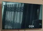 42 Inch Smart HD Android TV with Remotes + Wall Mount