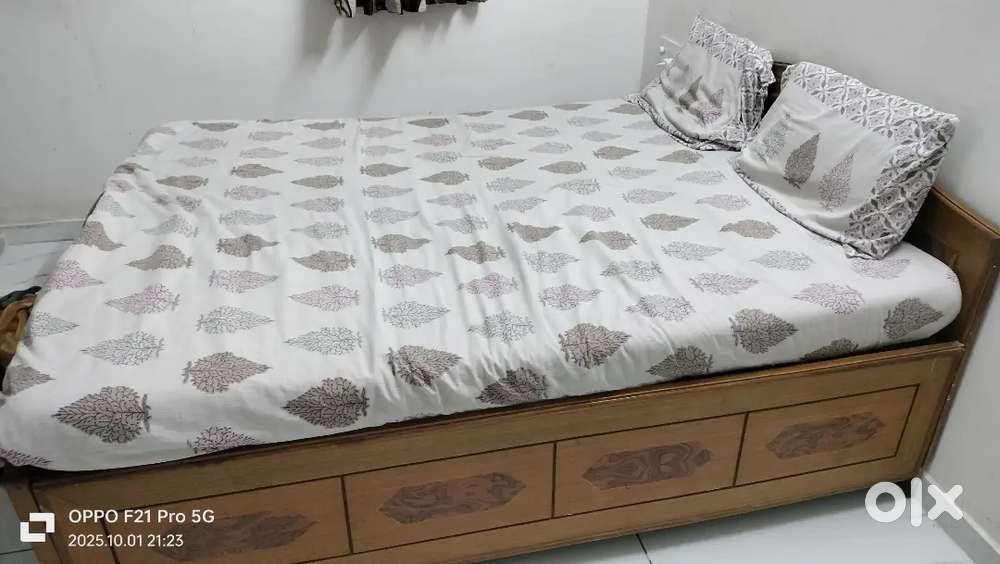 Well furnished bed with mattress