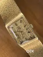 Omega. 14kt solid gold
