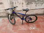 ROADEO CYCLE WITH DISC BRAKES AND SHOCKER