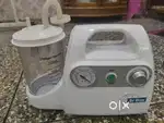 Portable suction machine