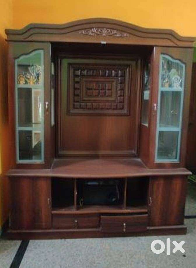 Royal Oak TV Cabinet with storage and glass shelves.