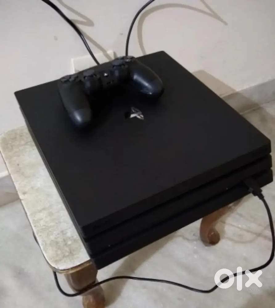 PS4 Pro 2TB SSD 42-Gams & 2 Controllers for sale.