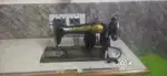 Working sewing machine with motor and stand