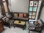Excellent condition sheesham wooden sofa set with center table
