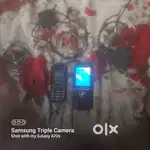 Two ph new condition samsung  n carvaan brand keypad with charger  n h
