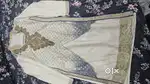 Pakistani kurti blue and off white  colour with heavy work yet elegant