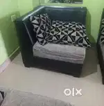 Six seater sofa along with a table