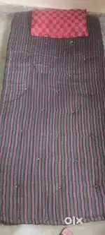 Its a comfortable cotton filled mattress only 1 month used.