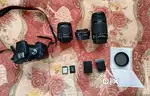 Canon 1500D with 
3 lenses and other items